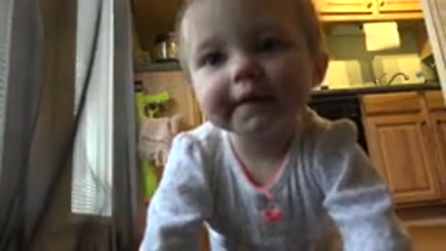 WESTMINSTER COLORADO-2015: Baby Girl Roaming On The Kitchen Floor And Smiling In