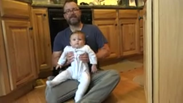 WESTMINSTER COLORADO-2015: Man In Glasses And Beard Plays With Happy Baby Girl
