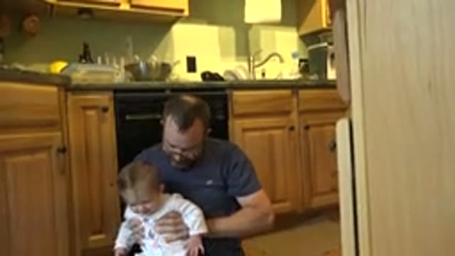 WESTMINSTER COLORADO-2015: Father Lovingly Holding and Lifting Small Toddler