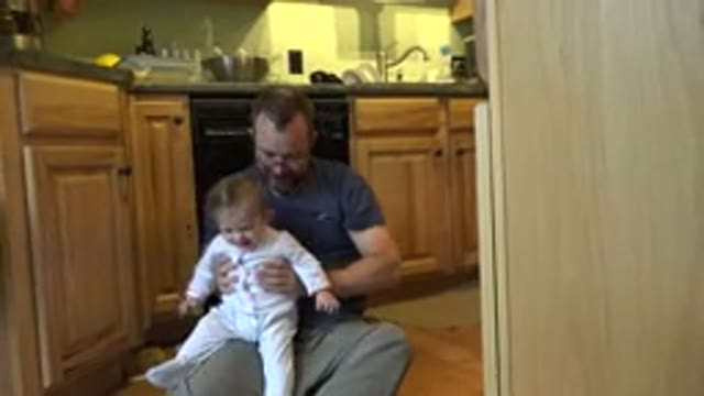 WESTMINSTER COLORADO-2015: Baby Playing And Having Fun With His Father In The Kitchen