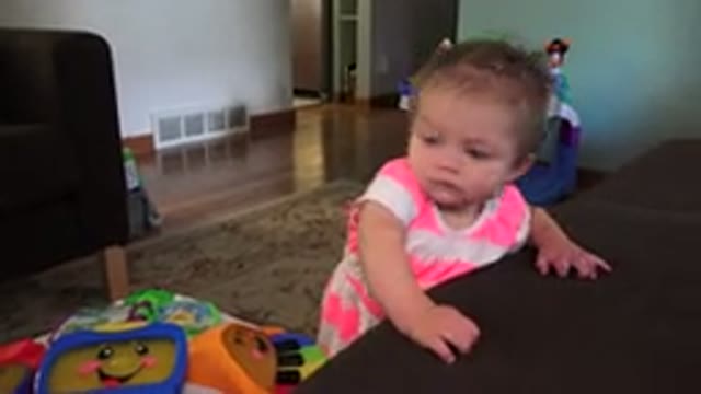 WESTMINSTER COLORADO-2015: Baby Near A Couch In A Living Room Playing With A