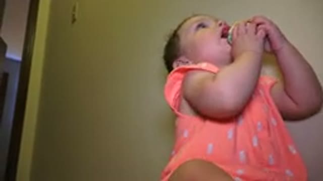 BROOMFIELD COLORADO-2015: A Baby Playing With A Baby Toy