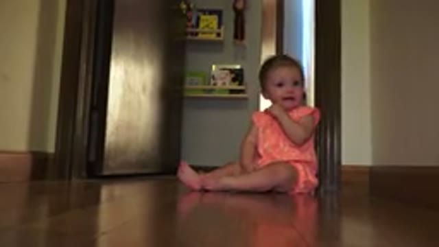 BROOMFIELD COLORADO-2015: Little Baby Girl Crawls While Crying To The Camera