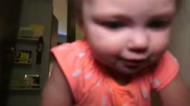 BROOMFIELD COLORADO-2015: Beautiful Smiling Baby Crawling Around The Room And
