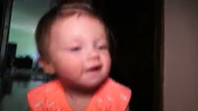 BROOMFIELD COLORADO-2015: Toddler Looking Up at Sky from Bird's-Eye View