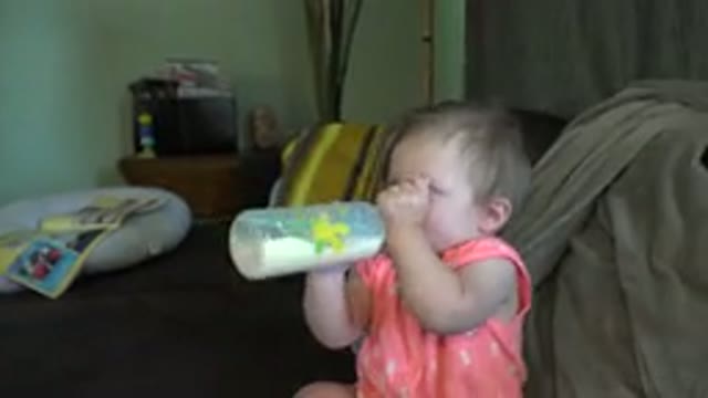 BROOMFIELD COLORADO-2015: Baby Drinking Formula Milk Bottle While Being Held