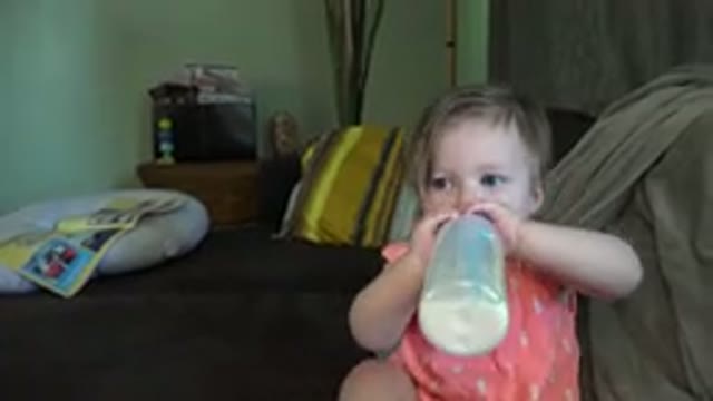 BROOMFIELD COLORADO-2015: Baby Drinking Milk From Baby Bottle