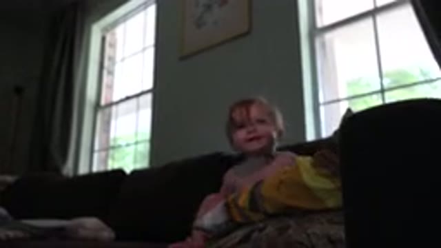 WESTMINSTER COLORADO-2015: A Cute Bear Cheated Toddler Sitting On A Couch In The Living Area