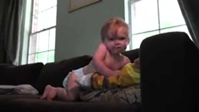 WESTMINSTER COLORADO-2015: Baby Sitting On A Couch In A House And Crawling