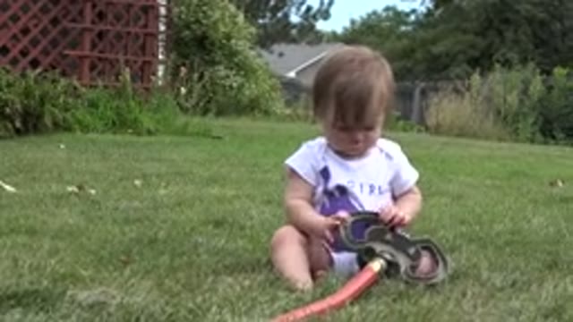 WESTMINSTER COLORADO-2015: Kid Plays With Garden Shower Unknowingly