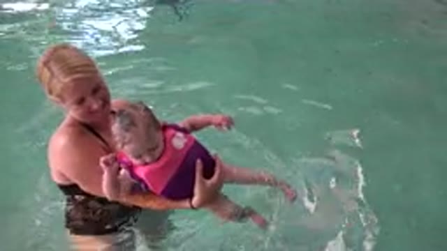 WESTMINSTER COLORADO-2015: A Mom And Daughter Play Together In The Pool While