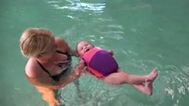WESTMINSTER COLORADO-2015: Baby Enjoying Pool Fun With Mother