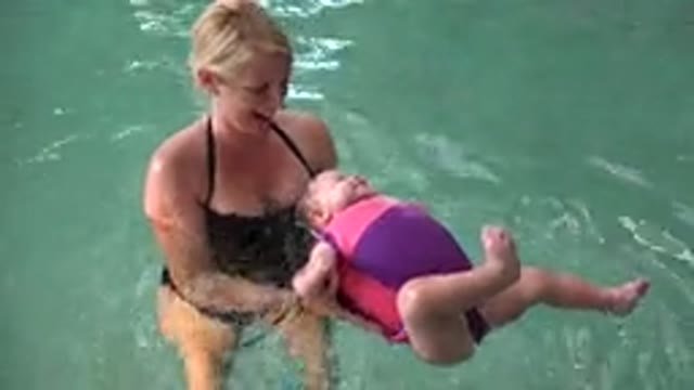 WESTMINSTER COLORADO-2015: Newborn Baby Learn To Swim With Mother Help