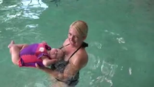 WESTMINSTER COLORADO-2015: Woman In A Pool With A Baby And Both Are Swimming