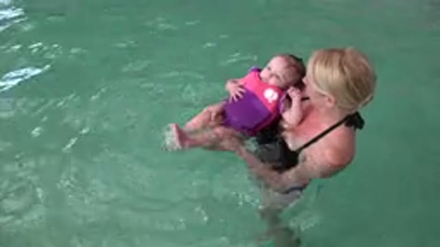 WESTMINSTER COLORADO-2015: Mom And Baby Swimming In A Pool And Playing