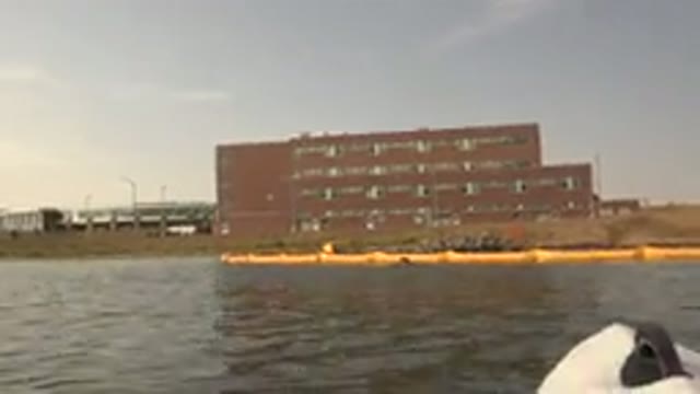 HIDDEN LAKE COLORADO-2015: Brown Building And White Object Floating In Water On
