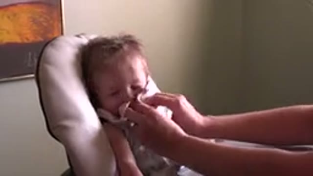 HIDDEN LAKE COLORADO-2015: A Cute Kid Is Cleaned Her Mouth By Her Mom