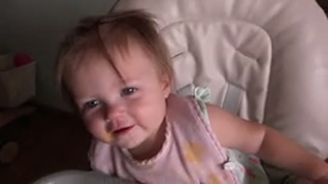 HIDDEN LAKE COLORADO-2015: A Blond Little Girl With Round Cheeks And Light Eyes