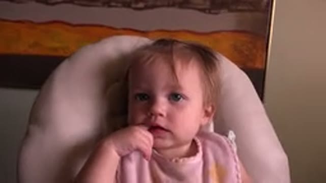 HIDDEN LAKE COLORADO-2015: Baby In Highchair Talking Waiting To Be Cleaned Up