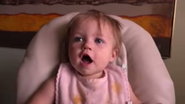 HIDDEN LAKE COLORADO-2015: Cute Baby In A Chair Reacts To Something In Front Of