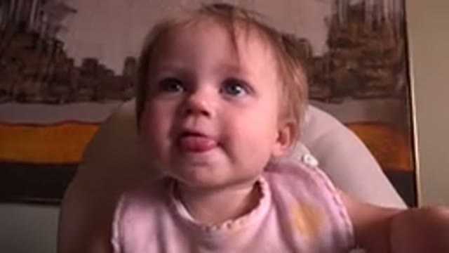 HIDDEN LAKE COLORADO-2015: Baby Sitting On Chair Reacting To Camera