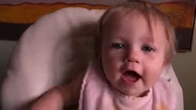 HIDDEN LAKE COLORADO-2015: Cute Baby Girl Attempts To Touch The Camera in Front