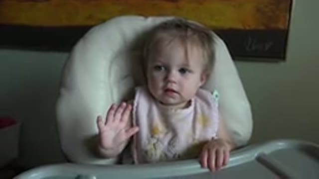 HIDDEN LAKE COLORADO-2015: Baby With His Dirty Bib Sitting In The Highchair