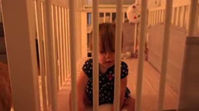 WESTMINSTER COLORADO-2015: A Beautiful Little Girl In The Crib With Her Dog