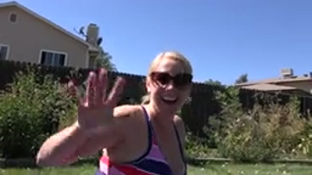 WESTMINSTER COLORADO-2015: A Woman Smiling And Waving At The Camera