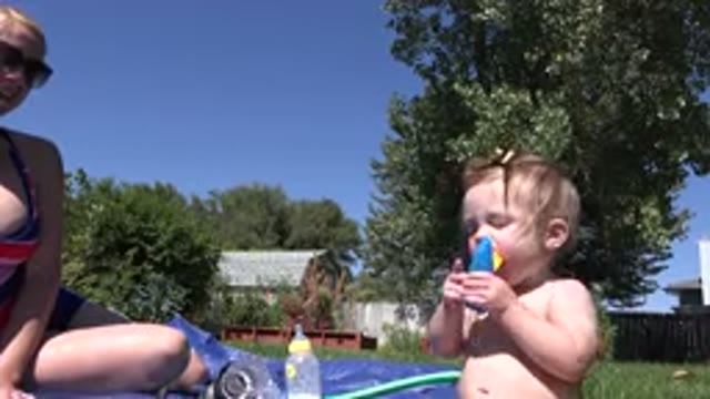 WESTMINSTER COLORADO-2015: Innocent Baby Enjoying Her Treat In Her Pool On A