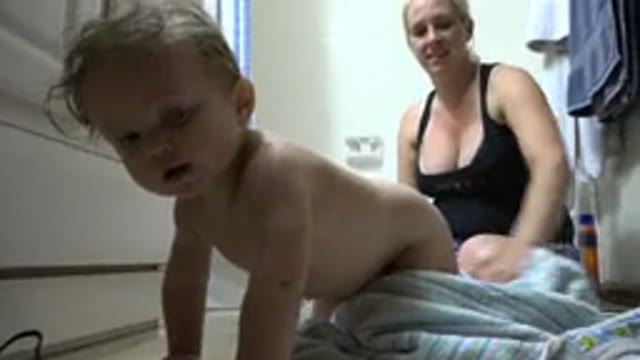 WESTMINSTER COLORADO-2015: Little Baby Boy Crawling Naked Away From His Mom