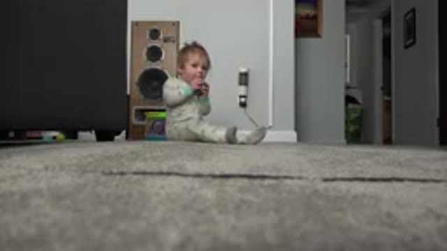WESTMINSTER COLORADO-2015: Baby On The Carpeted Floor Biting Plastic Toy Near A