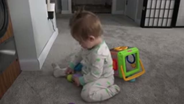WESTMINSTER COLORADO-2015: Daughter Playing With Toys In The Cold Morning Room