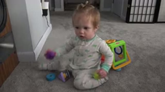 WESTMINSTER COLORADO-2015: Child Playing With Geometric Toys In House