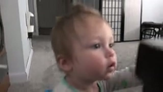 WESTMINSTER COLORADO-2015: Male Baby in Blue Pajamas Playing on Carpet with Toys