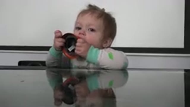 WESTMINSTER COLORADO-2015: Blonde Baby With Blue Eyes Leaning Against A Table