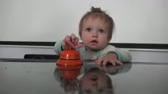 WESTMINSTER COLORADO-2015: Baby Grabbing Red Hotel Bell And Putting It In Mouth