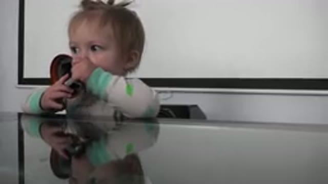 WESTMINSTER COLORADO-2015: A Child Chewing On A Bell That Is Taken Out Of Its