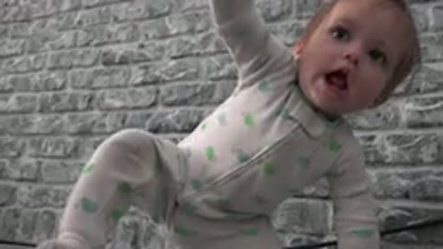 WESTMINSTER COLORADO-2015: A Baby Leaning On A Wall To Learn How To Stand