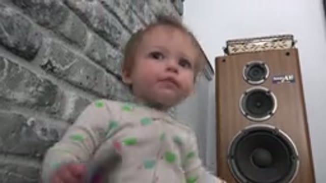 WESTMINSTER COLORADO-2015: Baby Girl Playing and Listening to Music