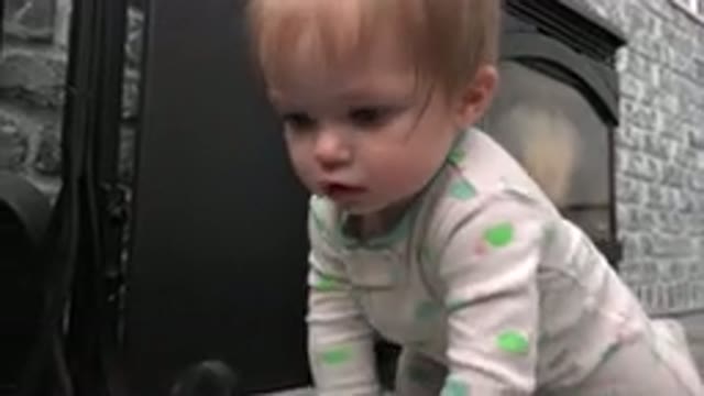 WESTMINSTER COLORADO-2015: Baby Crawling On Ground In Pajamas In Front Of Stone