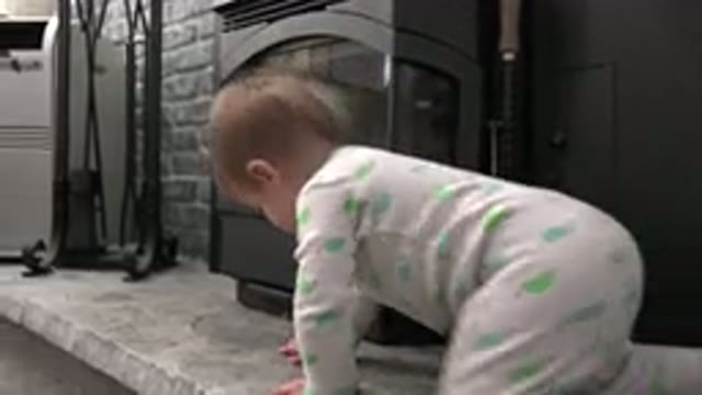 WESTMINSTER COLORADO-2015: The Baby Crawling Around The Yard Near A Closed Door