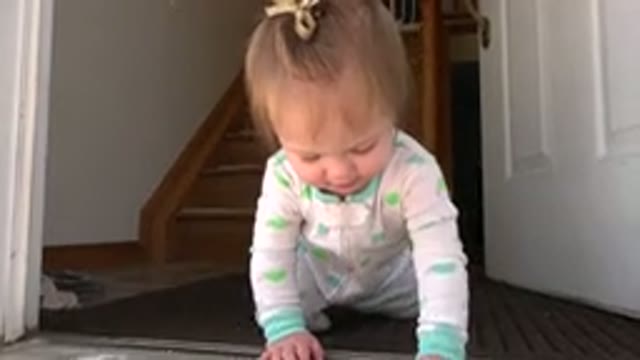 WESTMINSTER COLORADO-2015: A Little Girl Beginning To Crawl On The Ground At The