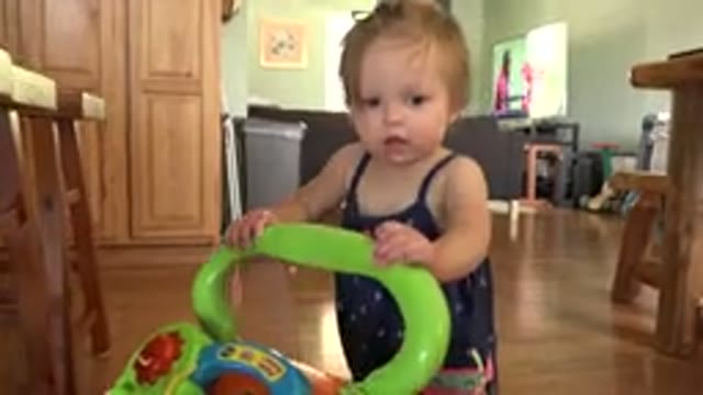 WESTMINSTER COLORADO-2015: Baby Standing In A House And Playing With Toys
