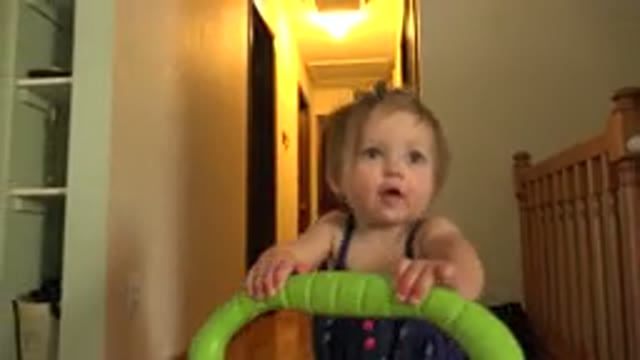 WESTMINSTER COLORADO-2015: Baby Walking Indoors Near The Stairs With Colorful