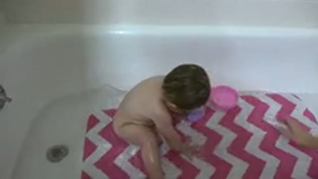 WESTMINSTER COLORADO-2015: Baby Plays With Purple Cup While Taking A Bath In A