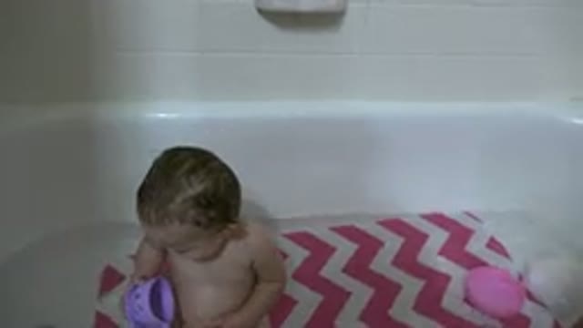 WESTMINSTER COLORADO-2015: Cheerful Baby in Bathtub Having Great Bath Time