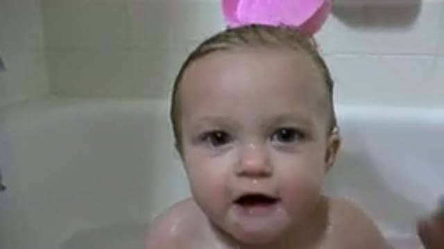 WESTMINSTER COLORADO-2015: Baby Enjoys Bath in Tub With Pouring Water on Head