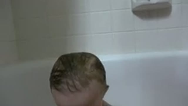 WESTMINSTER COLORADO-2015: Blue Eyes Baby Taking a Hot Bath in the Bathtub