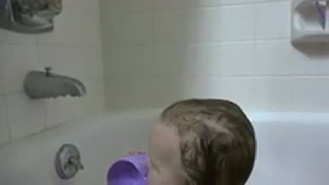 WESTMINSTER COLORADO-2015: Mother Bathing Her Baby and Playing with Toy Cups